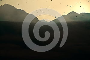 Backlit paper mountains