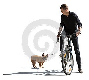 Backlit photo of a man riding a bike with his dog