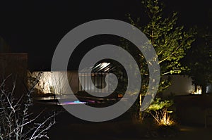 backlit swimming pool frozen in ice in winter. an ideal bath after a