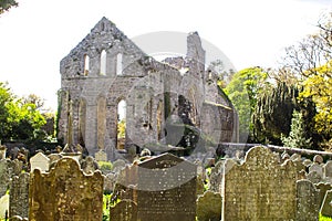 A backlit view of the ruins of the historic Greyabbey Monastery