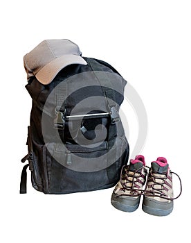 Backpack, cap and shoes backpackers isolated on white