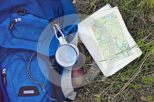 Backpack and map.