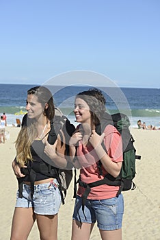 Backpacker arriving on the beach