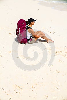 Backpacker on beach