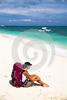 Backpacker on beach