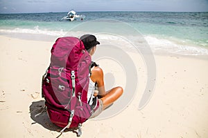 Backpacker on beach