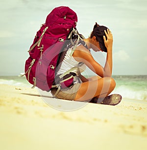 Backpacker on beach