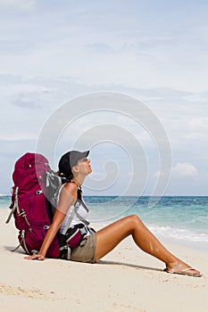 Backpacker on beach