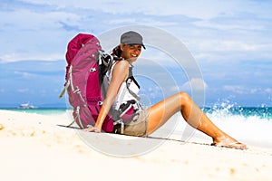 Backpacker on beach