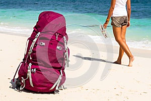 Backpacker on beach photo