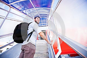 backpacker boarding the airplane