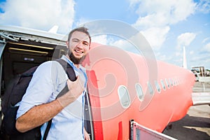 backpacker boarding the airplane