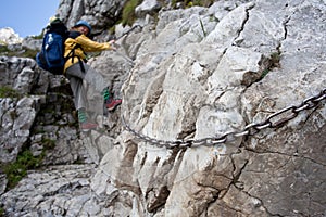 Backpacker girl on chains.