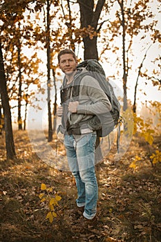 Backpacker Hiking In Autumn Nature Outdoors