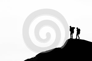 Backpacker on hill