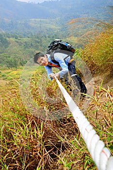 Backpacker man on chains photo