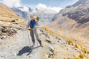 Backpacker mountaineer standing posing mountain trail, El Choro