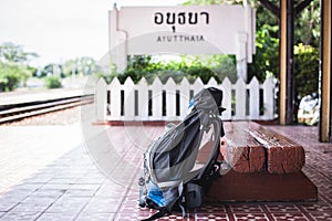 Backpacker put on the floor in train station