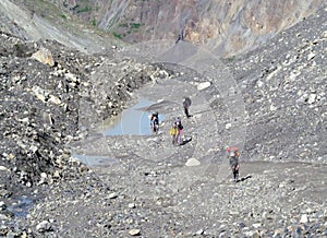 Backpacker tourist group in rocky mountains