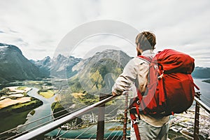 Backpacker traveling in Norway enjoying aerial mountains