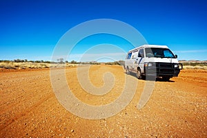Backpacker Van On A Desert Road