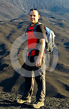 Backpacker on volcano Pacaya