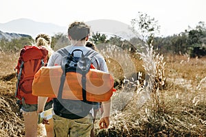 Backpackers on an adventure in the forest