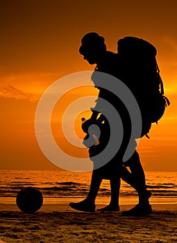 Backpackers on the beach