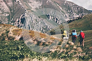 Backpackers hiking in mountains