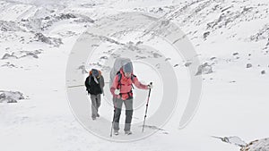 Backpackers on Larke Pass in Nepal, 5100m altitude. Manaslu circuit trek area.