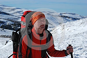 Backpackers in the winter hiking