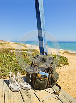 Backpacking traveller in a beach rest. Tavira island, Algarve. Portugal