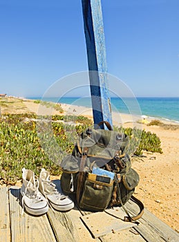 Backpacking traveller in a beach rest. Tavira island, Algarve. Portugal photo