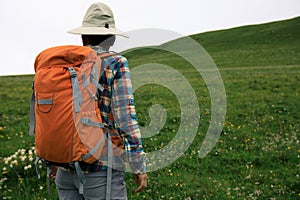 Backpacking woman hiking