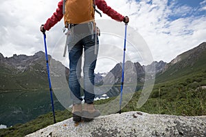 Backpacking woman hiking in the nature