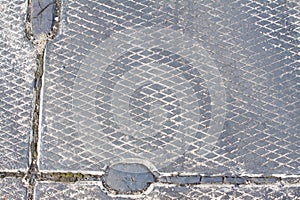 Backround pattern concrete beton plate covers at airfield with rubber traces left by sport cars tires during drifting competitio