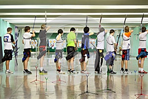 Backs of archers at Championship