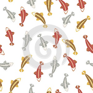 Backs of multicolored bright red gold and silvery carps on a white background