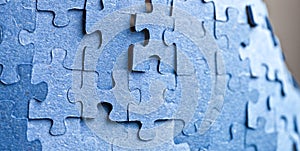Backside of blue puzzle jigsaw