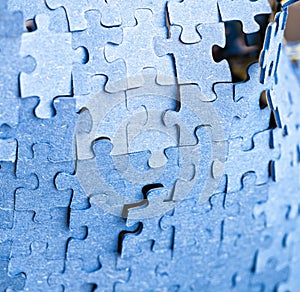 Backside of blue puzzle jigsaw