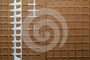 Backside of ceramic tiles with white engobe paste