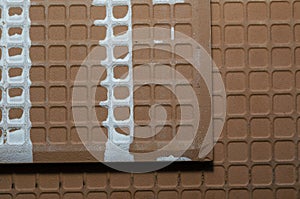 Backside of ceramic tiles with white engobe paste