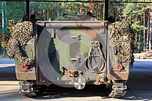 Backside of a fully tracked armored personnel carrier