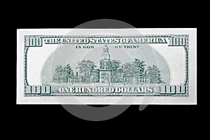 Backside money usa 100 american dollars on isolated black background