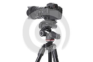 Backside view of modern multifunctional black camera isolated