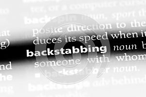 backstabbing
