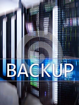 Backup button on modern server room background. Data loss prevention. System recovery