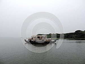 Backwaters of Kerala during monsoon - house boat, India tourism