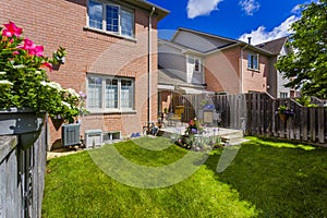 Backyard garden of custom built luxury house in the suburbs of Toronto, Canada.