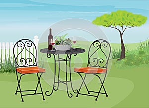 Backyard Garden Scene with Bistro Table photo